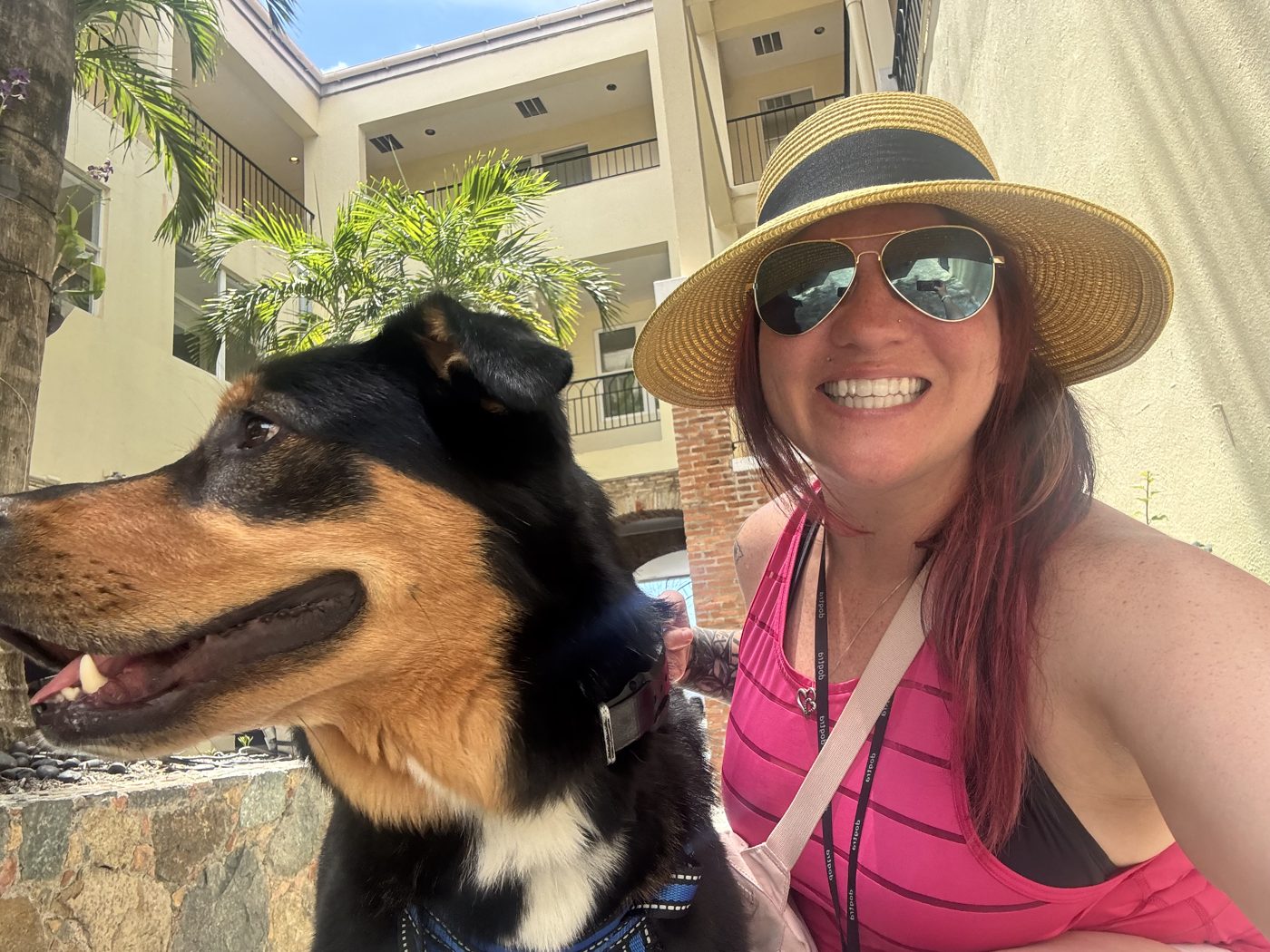 Joanna smiling beside Milo